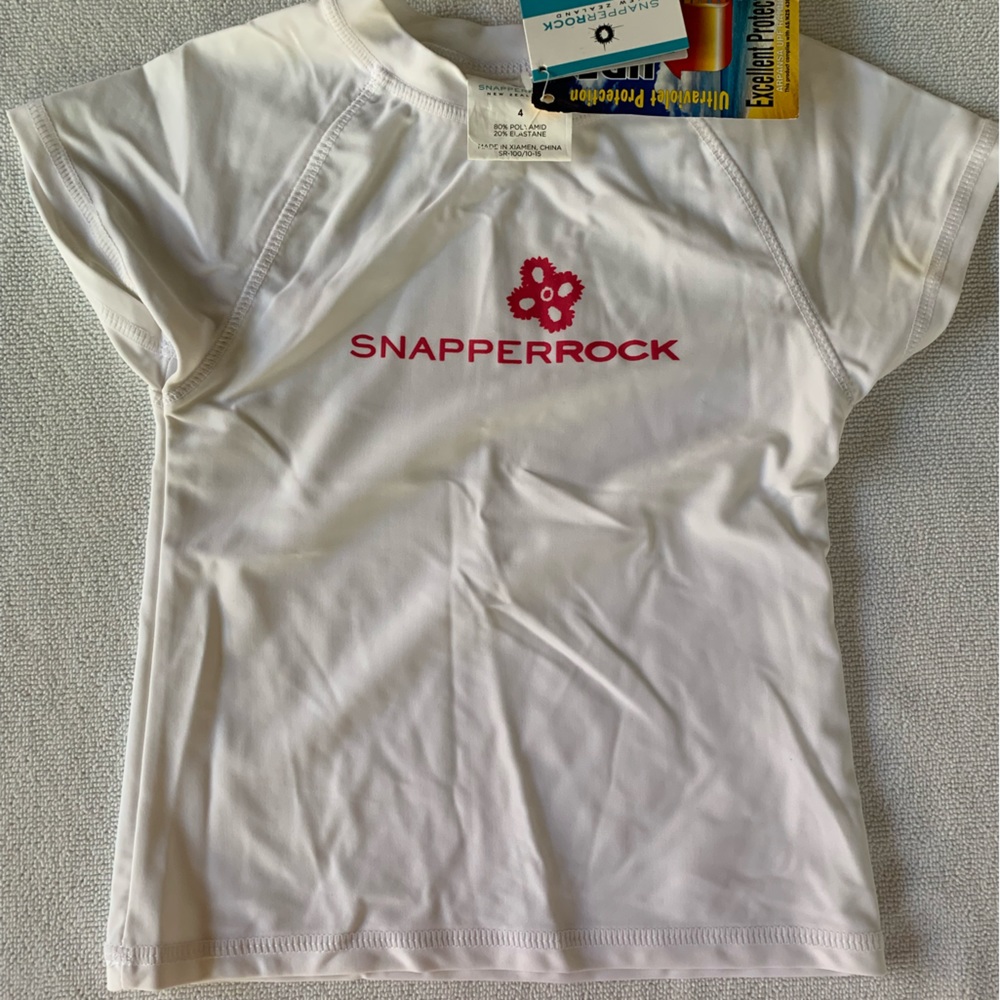 Snapper rock NWT girls swim rash guard . White with pink logo. Size 4